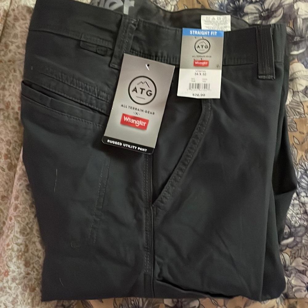 NWT never used wrangler ATG pants , size 34 by 32. Dark grey color.